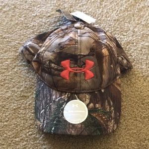 Never worn pink and camo under armour hat